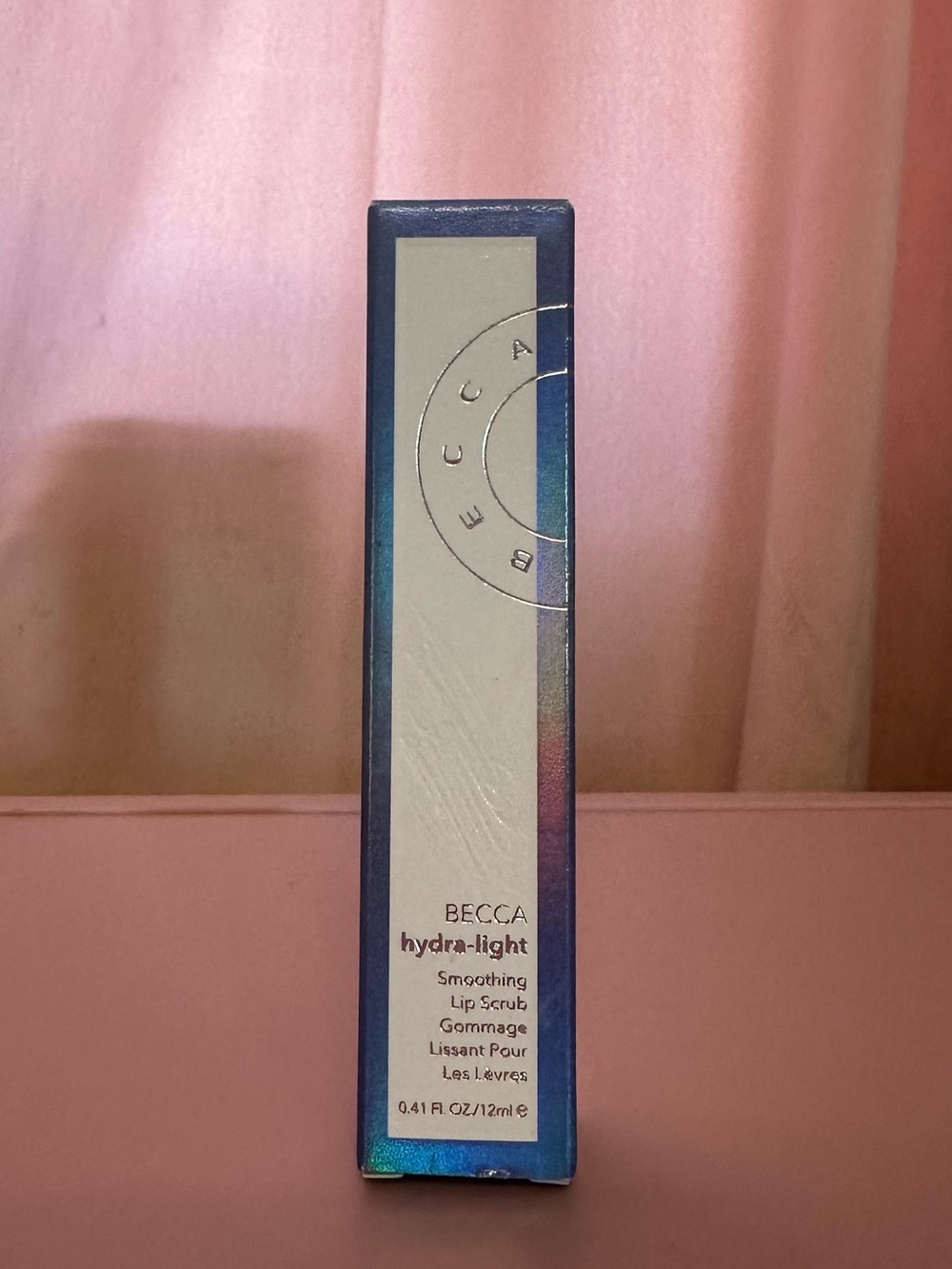 BECCA Hydra-Light Smoothing Lip Scrub — Blue iridescent box